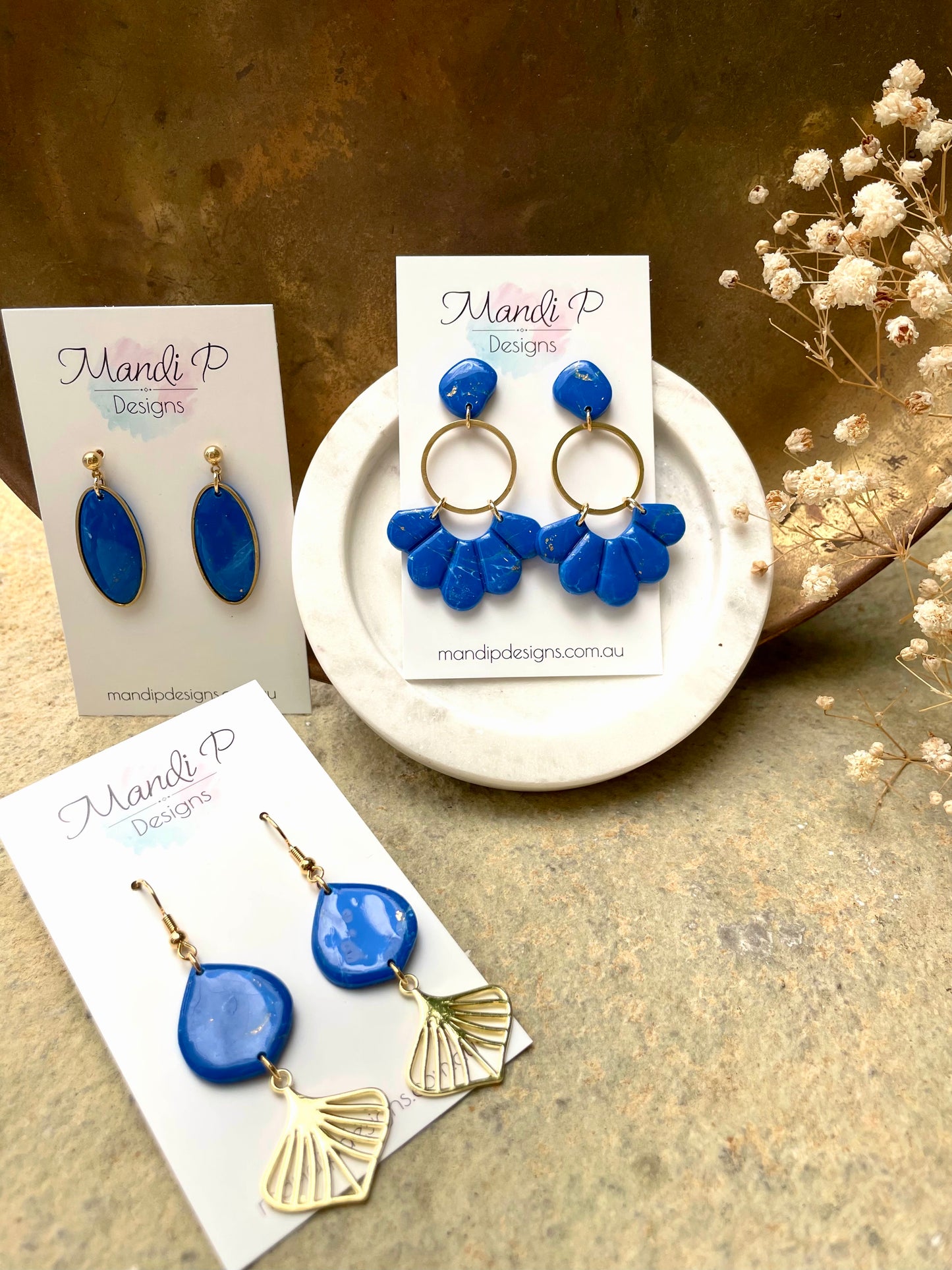 Blue lapis earrings with gold hardware
